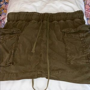 Green skirt from cloth and stone
